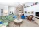Comfortable living room with a large sectional sofa and a view to the kitchen at 4195 Fairway Pl, North Port, FL 34287