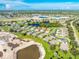 Aerial view highlighting home's location in community at 4195 Fairway Pl, North Port, FL 34287