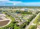 Aerial view showing home's location within community at 4195 Fairway Pl, North Port, FL 34287