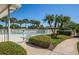 Walkway leading to a refreshing community pool at 4195 Fairway Pl, North Port, FL 34287