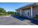 Community clubhouse with parking and lake view at 4195 Fairway Pl, North Port, FL 34287
