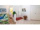 Bright and airy entryway with tile floors and access to other rooms at 4195 Fairway Pl, North Port, FL 34287