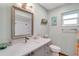 Spa-like bathroom with a modern vanity and shower at 2480 Alamander Ave, Englewood, FL 34223