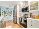 Modern kitchen with stainless steel appliances at 2480 Alamander Ave, Englewood, FL 34223