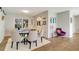 Bright dining area with a round table and six chairs at 2480 Alamander Ave, Englewood, FL 34223