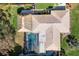 Overhead view of house with pool and cabana at 2480 Alamander Ave, Englewood, FL 34223