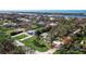 Aerial view of houses and properties located near the ocean at 2480 Alamander Ave, Englewood, FL 34223