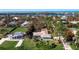 Bird's eye view of teal home near the water at 2480 Alamander Ave, Englewood, FL 34223