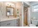 Clean bathroom with a shower and updated vanity at 2480 Alamander Ave, Englewood, FL 34223