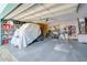 Attached garage with ample storage and room for vehicles at 2480 Alamander Ave, Englewood, FL 34223