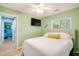 Guest bedroom with a comfy bed and flat-screen TV at 2480 Alamander Ave, Englewood, FL 34223