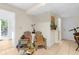 Laundry area with access to the backyard, and seating at 4024 Casey Key Rd, Nokomis, FL 34275