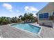 Spacious pool with a large deck and tropical landscaping at 4024 Casey Key Rd, Nokomis, FL 34275