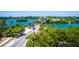 Aerial view of a road and bridge near a lush waterway at 4024 Casey Key Rd, Nokomis, FL 34275