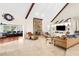 Large living room with stone fireplace and comfortable seating area at 4024 Casey Key Rd, Nokomis, FL 34275