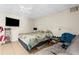 Bedroom with a bed, a couch, and a TV at 4024 Casey Key Rd, Nokomis, FL 34275