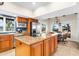 Island kitchen with granite countertops and stainless steel appliances at 4024 Casey Key Rd, Nokomis, FL 34275