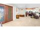 Elegant entryway with double wood doors and views into spacious living areas at 4024 Casey Key Rd, Nokomis, FL 34275