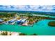 Aerial view of marina, boat slips and waterfront property at 4024 Casey Key Rd, Nokomis, FL 34275