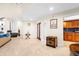 Bright hallway with access to kitchen and other rooms at 4024 Casey Key Rd, Nokomis, FL 34275