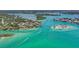 Aerial view of residential neighborhood with boats in the canal at 4024 Casey Key Rd, Nokomis, FL 34275