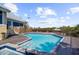 Inviting pool and spa with spacious wooden deck at 4024 Casey Key Rd, Nokomis, FL 34275