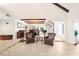 Open concept living space with seating area and views to dining area at 4024 Casey Key Rd, Nokomis, FL 34275