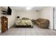 Comfortable bedroom with a double bed and couch at 4024 Casey Key Rd, Nokomis, FL 34275