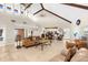 Open living room with high ceilings and access to multiple rooms at 4024 Casey Key Rd, Nokomis, FL 34275