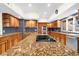 Updated kitchen featuring granite countertops and stainless steel appliances at 4024 Casey Key Rd, Nokomis, FL 34275