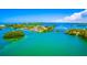 Aerial view of tropical island with bridge and waterway at 4024 Casey Key Rd, Nokomis, FL 34275