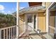 Private balcony with table and chairs, offering an outdoor space to relax at 4024 Casey Key Rd, Nokomis, FL 34275