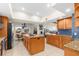 Modern kitchen with granite countertops and wood cabinets at 4024 Casey Key Rd, Nokomis, FL 34275