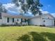Charming single story home with well-manicured lawn at 6738 Brentford Rd, Sarasota, FL 34241