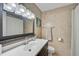 Clean bathroom with a shower/tub combo and updated vanity at 6738 Brentford Rd, Sarasota, FL 34241