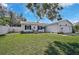 Cute ranch home with a fenced backyard and mature trees at 6738 Brentford Rd, Sarasota, FL 34241
