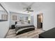 Main bedroom with a king-size bed and an ensuite bathroom at 6738 Brentford Rd, Sarasota, FL 34241