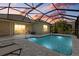 Inviting pool with screened enclosure, perfect for evening swims at 11712 Hendry Loop, Venice, FL 34293