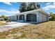 Newly renovated light teal home with carport at 6570 Coliseum Blvd, Port Charlotte, FL 33981