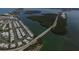 Aerial view of canal, bridge and residential area at 12026 Corsica Ln, North Port, FL 34287