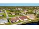 Aerial view of residential neighborhood showcasing homes and landscape at 12026 Corsica Ln, North Port, FL 34287