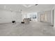 Spacious living room, under construction, with large window at 1247 Graham Rd, Venice, FL 34293