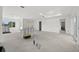 Bright and airy living room with large window; under construction at 1247 Graham Rd, Venice, FL 34293