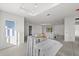 Unfinished living space with stacks of flooring materials at 1247 Graham Rd, Venice, FL 34293