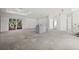 Unfinished living room with concrete floors and large window at 1247 Graham Rd, Venice, FL 34293