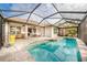 Inviting pool area with covered patio and pool at 1540 San Ysidro Way, Venice, FL 34285