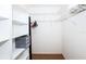 Well-organized walk-in closet with custom shelving and ample storage space at 172 Southampton Pl # 346, Venice, FL 34293