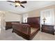 Bedroom with wood furniture, tile flooring and natural light at 192 Grand Oak Cir, Venice, FL 34292