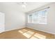 Bright bedroom featuring hardwood floors and ample natural light at 19256 Lappacio St, Venice, FL 34293