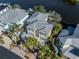 Two-story house, gray metal roof, waterfront view at 737 Shakett Creek Dr, Nokomis, FL 34275